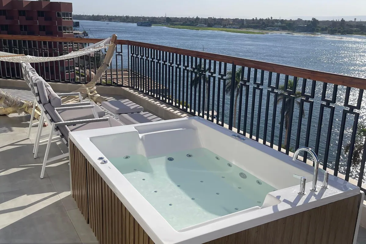 Jacuzzi Suite terrace with a private outdoor Jacuzzi above the Nile, Pyramisa Luxor